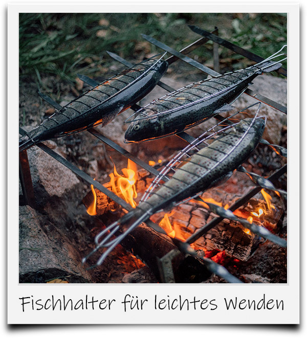 Bild von Forellen im Fischhalter auf dem Grillrost