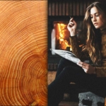 Zeitung lesende Frau vor Kamin