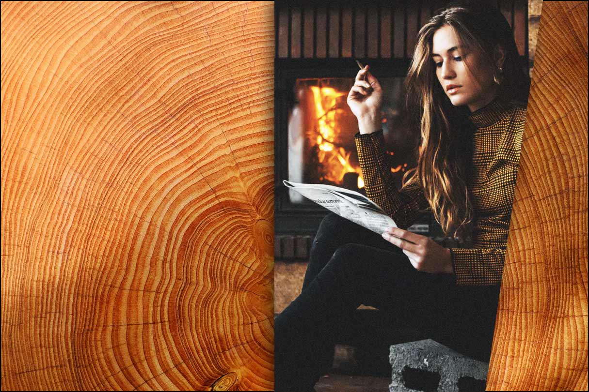 Zeitung lesende Frau vor Kamin