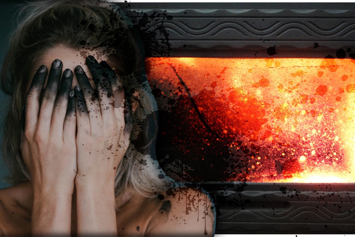 verrußte Kaminscheibe freibrennen und schwarz verdreckte Hände