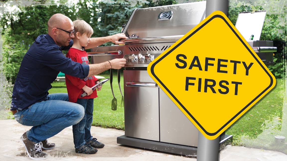 Bild Vater erklärt Sohn den Gasgrill und ein Safety First Schild