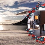 Ambientebild Polarnacht mit Tinyhaus und eingeblendeten Kaminofen Orion von Nordpeis