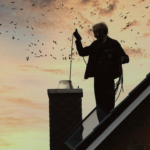 Schornsteinfeger auf dem Dach